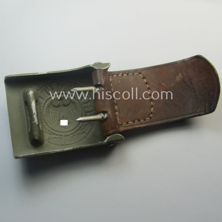 Superb, WH (Heeres) 'standard-pattern', field-grey-toned- and aluminium-based belt-buckle being a maker- (ie. 'Overhoff & Cie.'-) marked- and/or: '1938'-dated example that comes mounted onto its leather-based tab