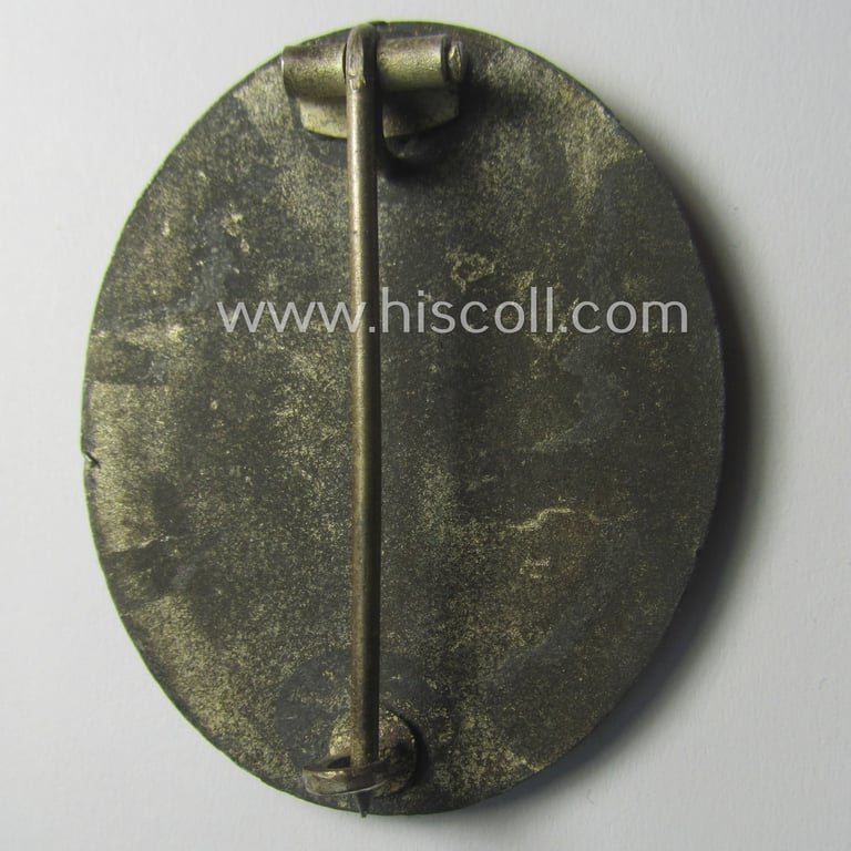 'Verwundeten-Abzeichen in Silber' being a non-maker-marked- and (I deem) mid-war-period zinc- (ie. 'Feinzink'-) based example as was produced by a (by me) unidentified maker