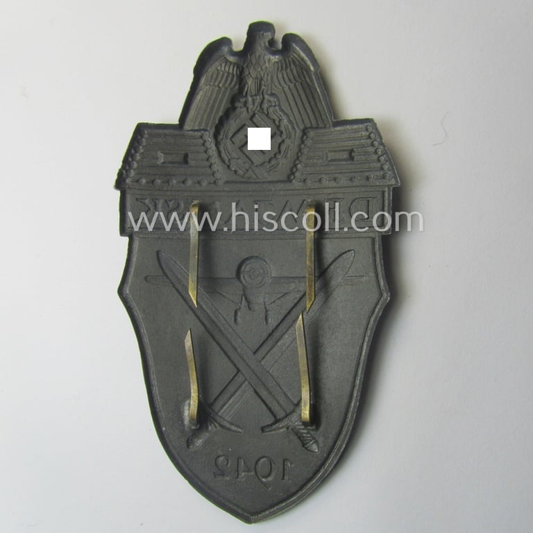 'Virtually mint' - albeit regrettably incomplete - example of a WH (Heeres ie. Waffen-SS) 'Demjansk'-campaign-shield as executed in typical non-magnetic, zinc (ie. 'Feinzink')