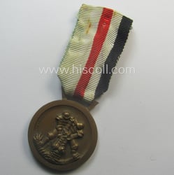 Golden-bronze-coloured- (and I deem 'Buntmetall'-based-) example of a:...