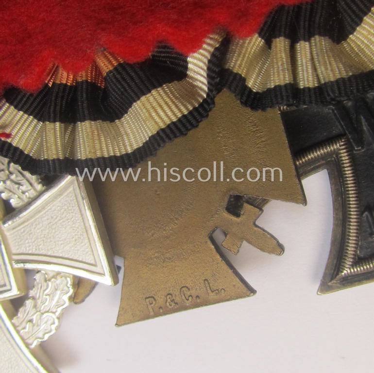 3-pieced, 'WWI'- (ie. TR-) related medal-bar (ie. 'Ordenspange') resp. depicting a WWI-period: 'EK II.Kl.', a: 'FKK 1914-18' and a: 'TD-Ez. der 2. Kl.'