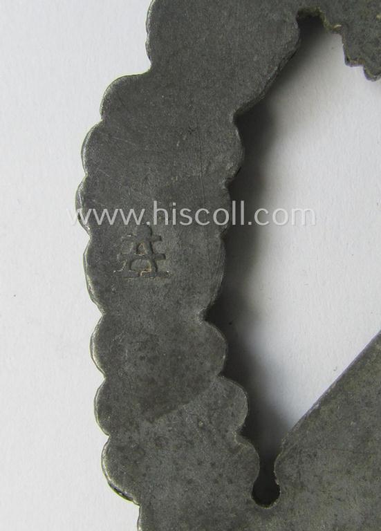 Attractive, 'Infanterie Sturmabzeichen in Silber' (or: silver infantry assault badge ie. IAB) being a nicely maker- (ie. 'A'-) marked example as executed in zinc-based metal (ie. 'Feinzink') as was produced by the: 'Assmann & Söhne'-company