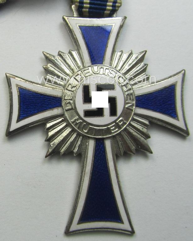 'Ehrenkreuz der deutschen Mutter - zweite Stufe' (or: silver-class mothers'-cross) that came mounted onto its long-sized ribbon and that came stored in its period pouch by the (unusual!) maker: 'Fritz Zimmermann - Stuttgart'