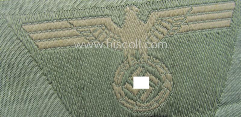 WH (Heeres) so-called: 'M43-pattern') cap-eagle/cocarde (ie. cap-trapezoid) as was specifically produced for usage on the so-called: 'M-43'-model field-caps (ie. 'Einheitsfeldmützen')