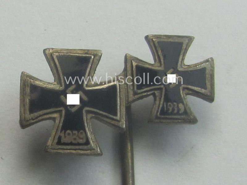 Detailed, 9-mm.-sized 'award'-lapel-pin' depicting respectively an 'EK I. Klasse' and a: 'EK II. Klasse' (being an unmarked and unusually enamelled example)