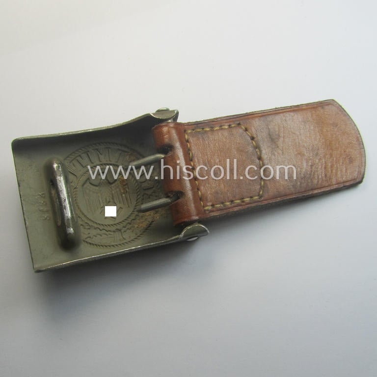WH (Heeres) 'standard-pattern', field-grey-toned- and aluminium-based belt-buckle being a maker- (ie. 'R. Sieper & Söhne'-) marked- and/or: '1938'-dated example that comes mounted onto its leather-based tab