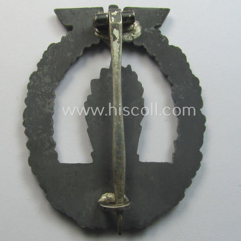 WH (Kriegsmarine) 'Kriegsabzeichen für Minensuch-, U-Boot-Jagd und Sicherungs-Verbände' being a detailed albeit non-maker-marked and 'Feinzink'-based example as was produced by the: 'Förster & Barth'-company