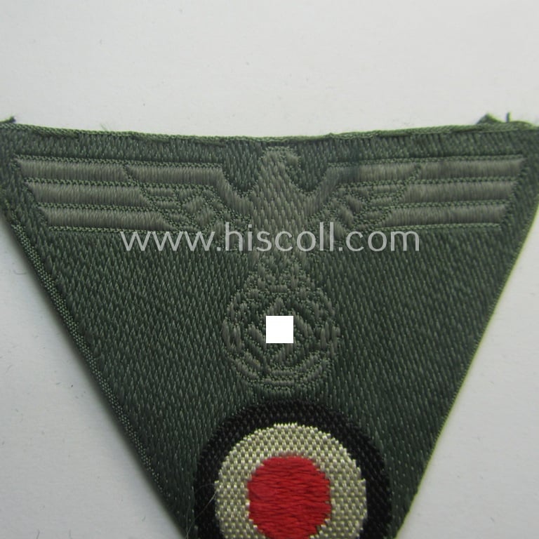 WH (Heeres) so-called: 'M43-pattern') cap-eagle/cocarde (ie. cap-trapezoid) as was specifically produced for usage on the so-called: 'M-43'-model field-caps (ie. 'Einheitsfeldmützen')