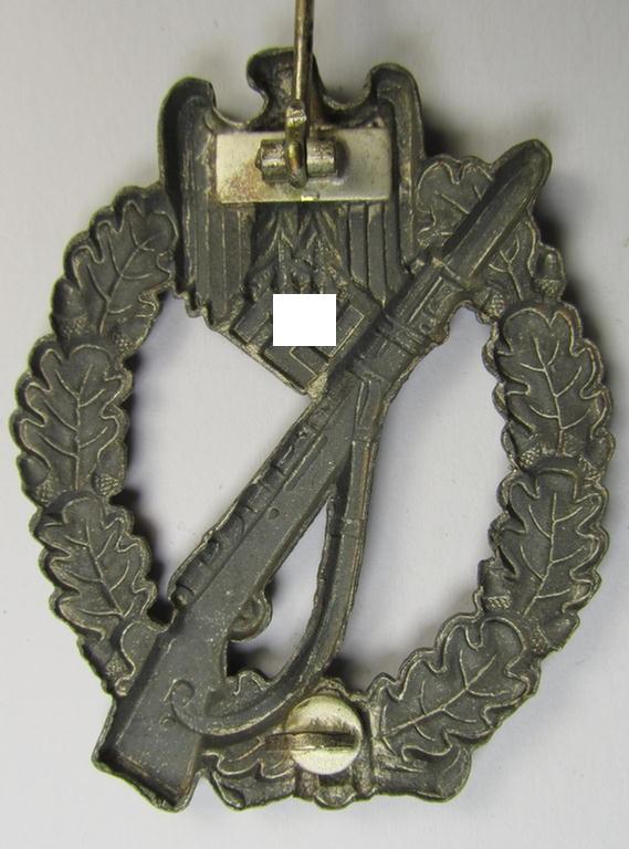 Superb, 'hollow-back' 'Infanterie Sturmabzeichen in Silber' (or: silver infantry-assault badge ie. IAB) being a non-maker-marked example as executed in zinc-based metal (ie. 'Feinzink') as was produced by the: 'Wilh. Deumer'-company