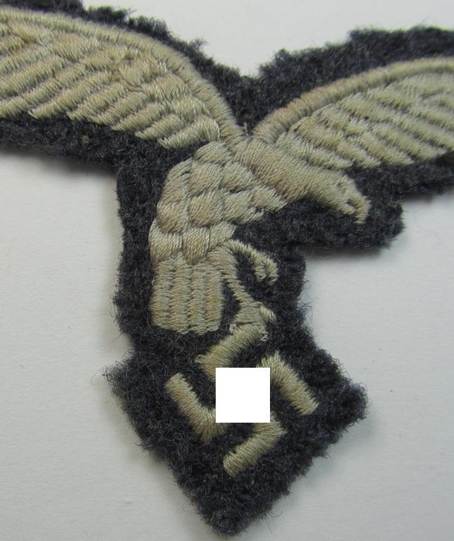 Moderately used- and/or tunic-removed, WH (Luftwaffe) EM- (ie NCO-) pattern, machine-embroidered breast-eagle (showing a 'down-tailed'-eagle and being an early- ie. pre-war-period example) that comes in a moderately used-, condition