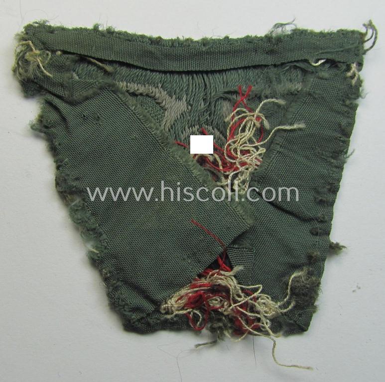 WH (Heeres) 'T-shaped' M42-model cap-eagle/cocarde as executed in 'BeVo'-weave pattern (being a minimally stained example that comes in a clearly used- ie. once cap-attached, condition)