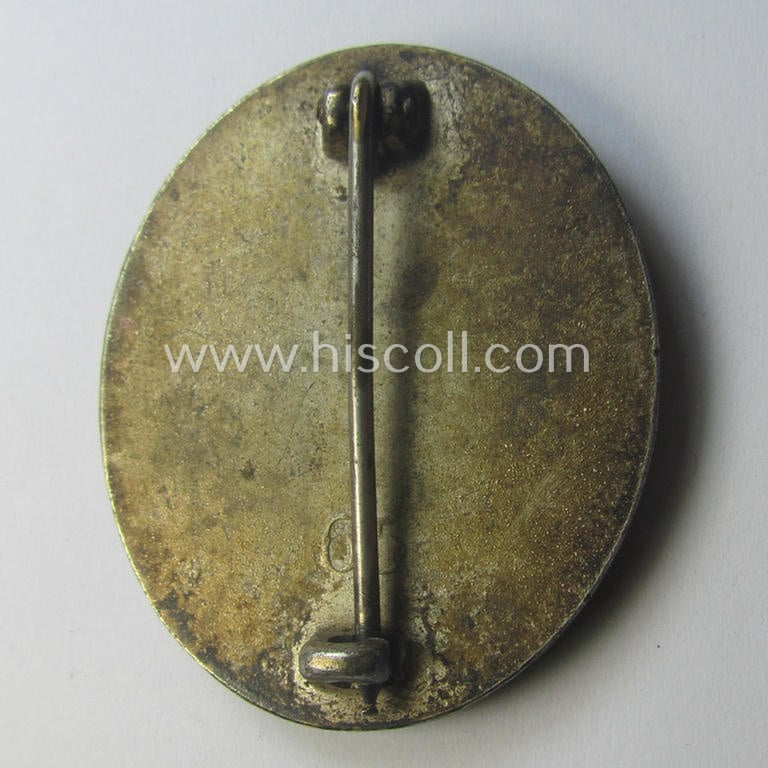 Silver-class wound-badge (or: 'Verwundeten-Abzeichen in Silber') being a maker- (ie. '65'-) marked example as was produced by the 'Hersteller' ie. maker: 'Klein u. Quenzer'