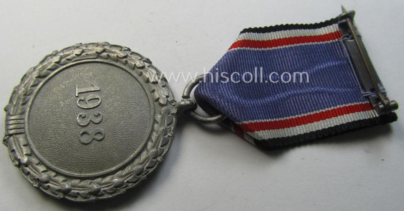 Neat, 'Luftschutz-Ehrenzeichen 2. Stufe' being a non-maker-marked example as executed in (light-weight) aluminium-based metal and that comes mounted onto its period (confectioned) ribbon ie. 'Bandabschnitt'