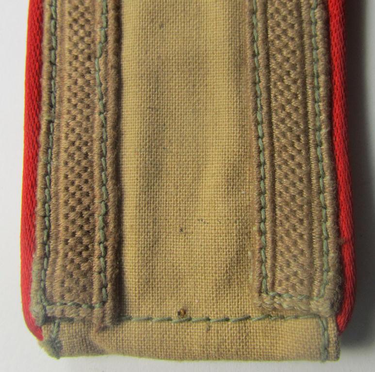 Single, WH (Luftwaffe) 'tropical-issued' NCO-type shoulderstrap (as was specifically intended for usage on the tropical-shirts ie. tunics) as was specifically intended for an: 'Uffz. der Flakartillerie-Trpn.'