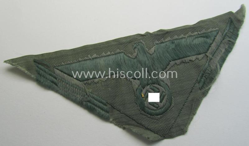 Later-war-period WH (Heeres) so-called: 'M44'-pattern- and/or: trapezoid-shaped breasteagle ie. 'Brustadler für Mannschaften u. Uffz.' (being a field-grey-coloured example that shows an interwoven 'BeVo-Wuppertal'-makers'-designation)