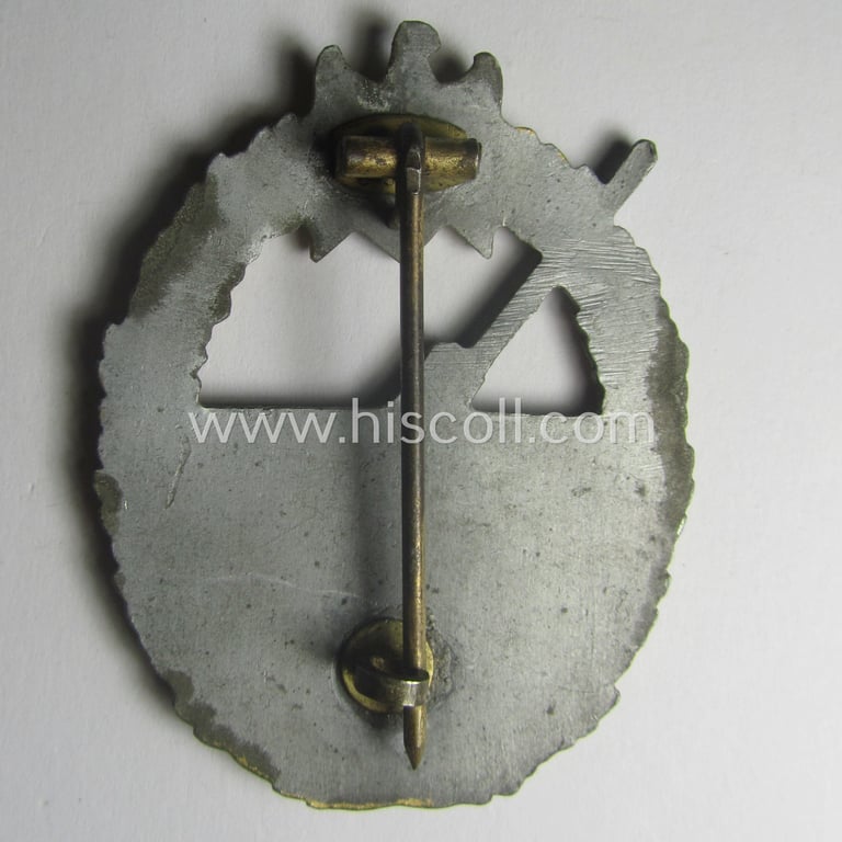 WH (Kriegsmarine) 'Marine-Artillerie-Abzeichen' being a typical non-maker-marked- and/or zinc- (ie. 'Feinzink'-) based example as was (presumably) produced by the: 'Alois Rettenmaier'-company