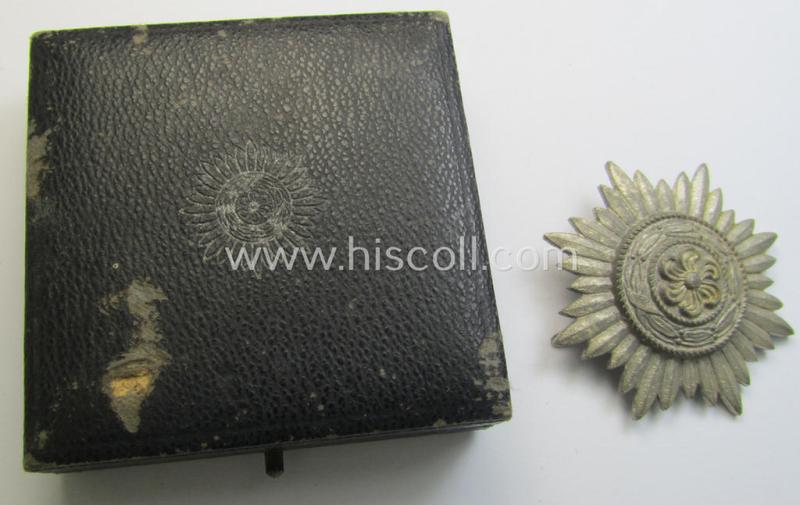 Attractive, WH-related, so-called: 'Verdienstauszeichnung o. Steckkreuz für Angehörige der Ostvölker, 1. Kl. in Silber ohne  Schwertern' being a maker- (ie. '100'-) marked example that comes stored in its accompanying, period-etui