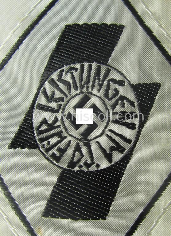 DJ- (ie. 'Deutsches Jungvolk'-) 'Leistungsabzeichen in Eisen in Stoff' that retains its period-attached 'RzM'-etiket