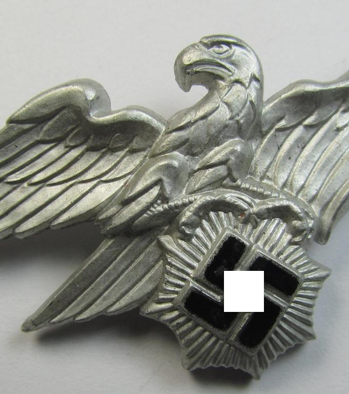 Attractive - and scarcely encountered! - officers'- (ie. evt. NCO-) pattern, aluminium-based so-called: 'Luftschutz' (ie. RLB-) visor-cap eagle being a maker- (ie. 'HA'-) marked example as was produced by the 'H. Aurich'-company