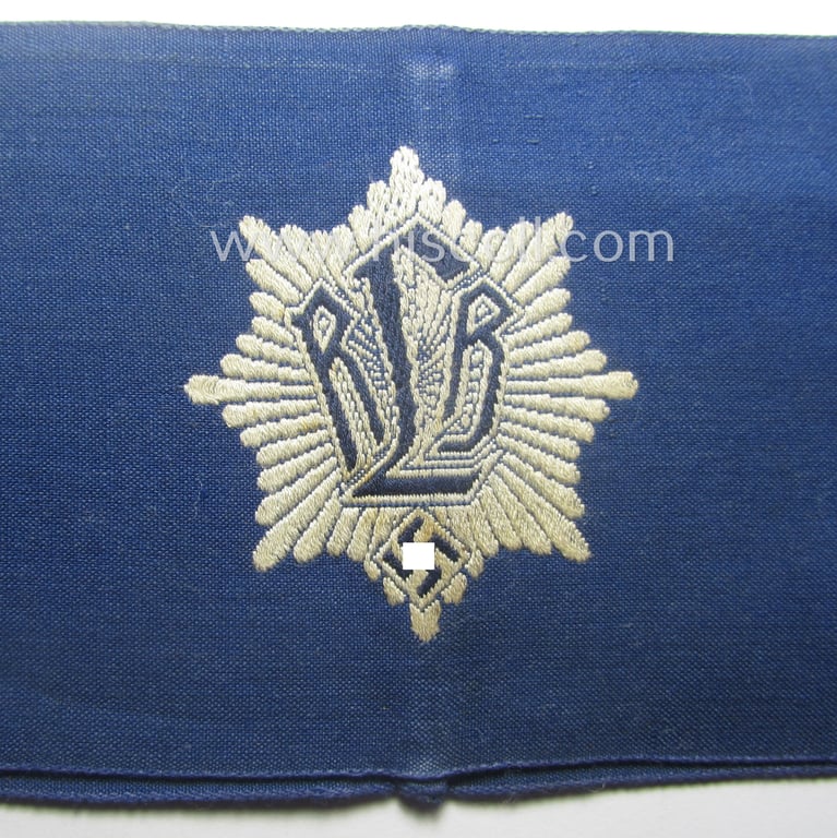 Hardly used, RLB (or: 'Reichsluftschutzbund') 'Amtsträger'-armband depicting the typical 'RLB'-logo (with additinional lettering)