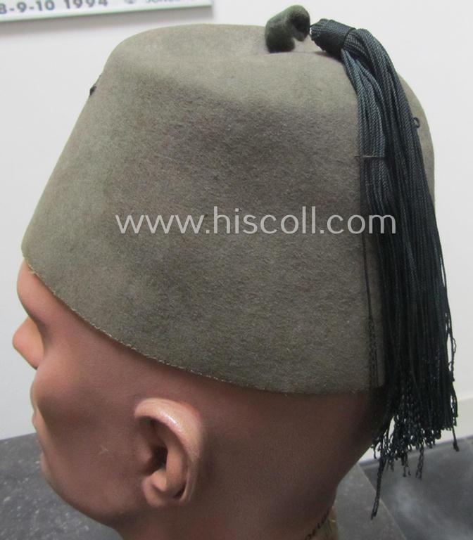 Superb - and rarely found! - field-grey-coloured and/or woolen-based: Waffen-SS 'Fez' (being a 'virtually mint- ie. unissued' example having a neat - and fully matching! - set of silver-grey-coloured 'BeVo'-insignia, originally-attached)