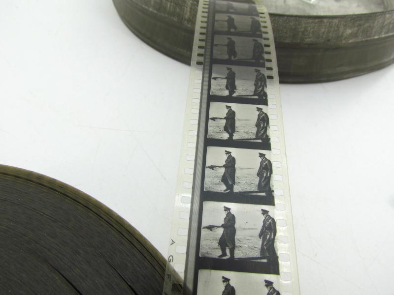 Large Film can with WWII 35mm film included