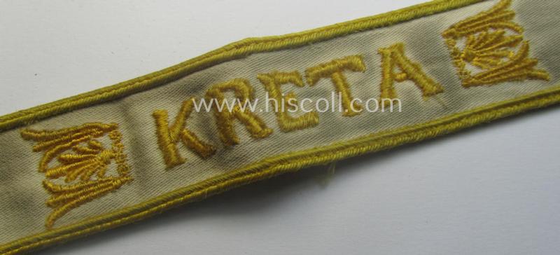 Truly worn WH cuff-title (ie. 'Ärmelstreifen') entitled: 'Kreta' (being a period-shortened example that comes in a clearly issued-, worn- and/or most certainly once tunic-attached, condition)
