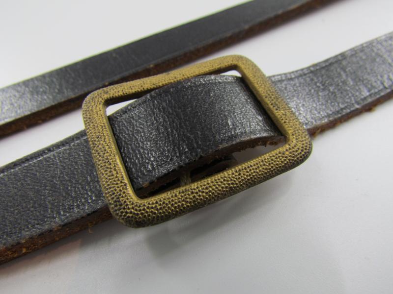 Leather shoulder strap marked DRGM