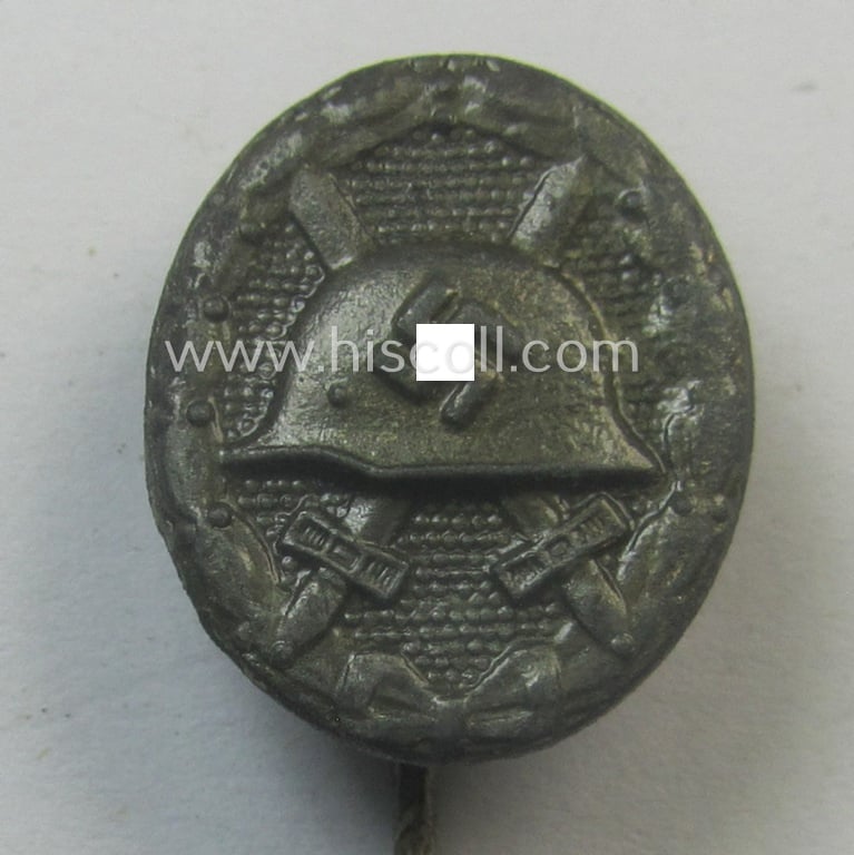 Neat - and 17 mm. sized! - miniature lapel-pin (ie. 'Halbminiatur') depicting a: 'Verwundeten-Abzeichen in Silber' (or: silver-class wound-badge) being a non-maker-marked example