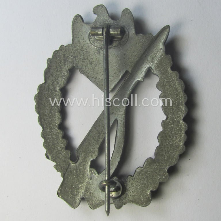 'Infanterie Sturmabzeichen in Silber' being a scarcely seen, non-maker-marked- and/or zinc- (ie. 'Feinzink'-) based specimen as was presumably procuded by the desirable: 'Ernst L. Müller'-company