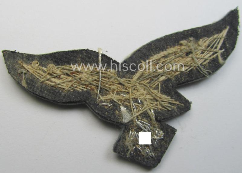 WH (Luftwaffe) officers'-pattern visor-cap-eagle (ie. 'Adler für LW-Offiziers-Schirmmütze') being a neatly hand-embroidered example of the: 'Extra Qualität' that comes in a 'virtually mint ie. unissued'-), condition