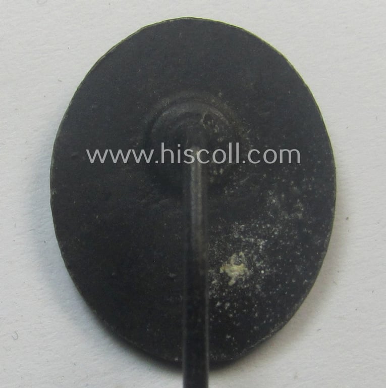 Neat - and 17 mm. sized! - miniature lapel-pin (ie. 'Halbminiatur') depicting a: 'Verwundeten-Abzeichen in Schwarz' (or: black-class wound-badge) being a maker- (ie. 'L/...?'-) marked example