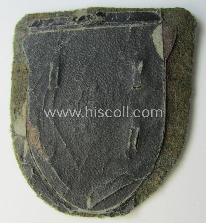 Very attractive - and actually scarcely encountered! - WH (Heeres ie. Waffen-SS) 'Kuban'-campaign-shield that comes mounted onto its original field-grey-coloured- and/or woolen-based 'backing'