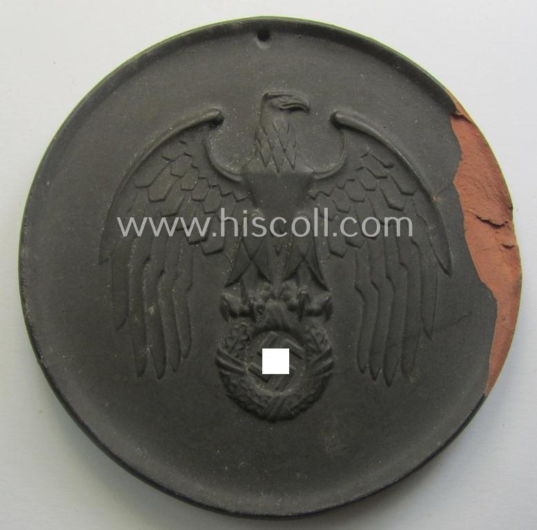 Regrettably damaged, earthenware (ie. 'Allach'-produced!): 'SS-Siegerplakette' as was issued during the: 'Sommer Sonnenwendwettkämpfen der SS' held in 1939 and that comes stored in its period, carton-based box as issued