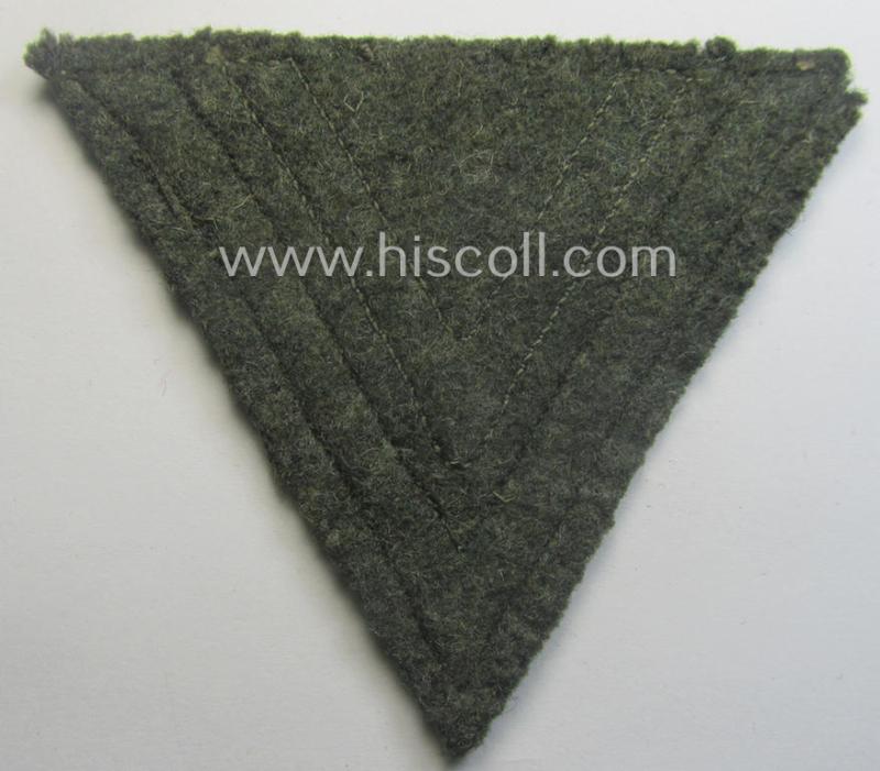 WH (Heeres) 'Armwinkel' (or: arm-chevron) as executed on typical field-grey-coloured wool as was specifically intended for usage by a soldier with the rank of: 'Obergefreiter'
