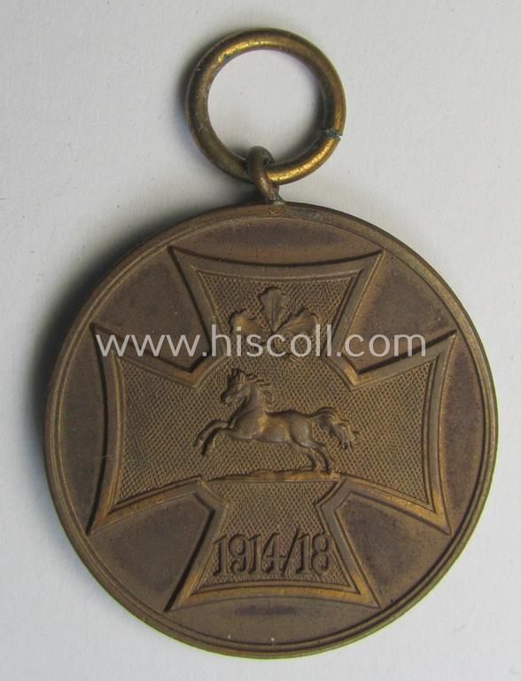 Attractive, (post)WWI-period - and neatly golden-bronze-toned! - so-called: 'Kriegsdenkmünze des Hannoverschen Landes-Kriegerverbandes' being a nicely preserved example that comes mounted onto its period ribbon (ie. 'Bandabschnitt')