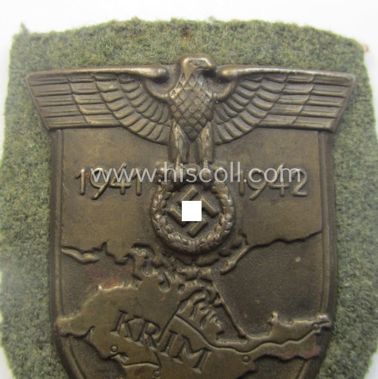 Truly used- and carefully tunic-removed, WH (Heeres o. Waffen-SS) 'Krim'-campaign-shield