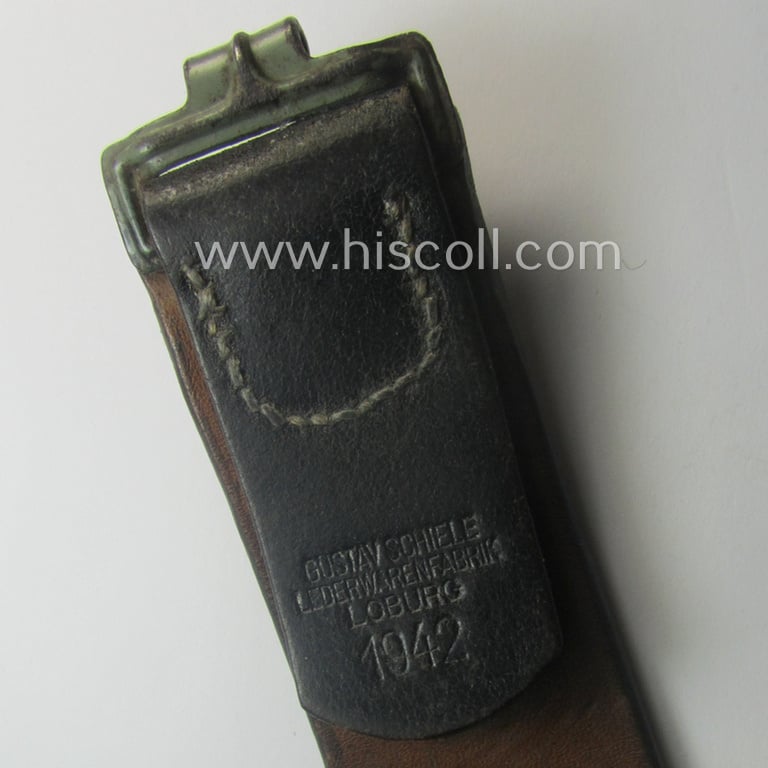 Moderately used, early- (ie. mid-) war-period, black-coloured WH (Heeres, Luftwaffe, Waffen-SS etc.) 'standard-issue'-pattern belt (ie. 'Koppelriemen') being a 105 cms. sized example that shows a (clear) makers'-designation and/or date: '1942'