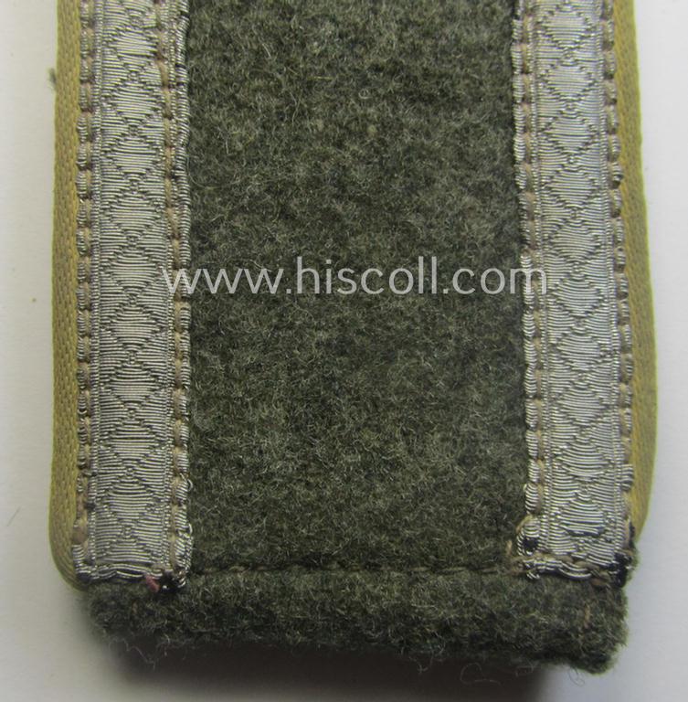 Single, early-war-period so-called: 'M40'- (ie. 'M43'-) pattern, WH (Heeres) tailor-made, NCO-type shoulderstrap as piped in the bright-yellow-coloured branchcolour as was intended for usage by an: 'Unteroffizier der Nachrichten-Trpn.'