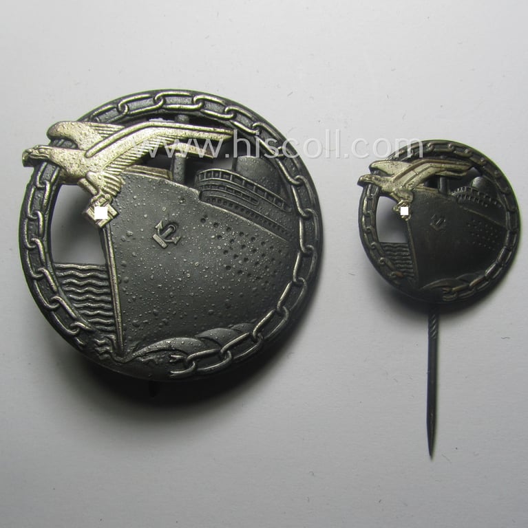 Attractive - and complete! - set comprising of a WH (KM) 'Blockadebrecher-Kriegsabzeichen' being a maker- (ie. 'Schwerin'-) marked example that comes together with its accompanying 'Halbminiatur' as stored in its (damaged- ie. relic) etui