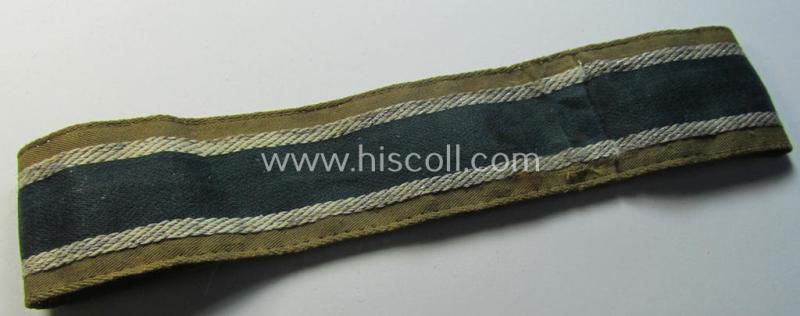 Superb, 'BeVo'-like cuff-title (ie. 'Ärmelstreifen') entitled: 'Afrikakorps' being a with certainty issued and truly worn example that comes in an overall nice- (ie. minimally shortened-, still sewn-together- and/or once tunic-attached-), condi...