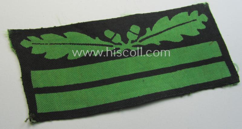 Attractive - clearly used albeit regrettably single! - officers'-pattern, WH (Heeres o. Waffen-SS) rank-insignia-bar (for usage on the camouflaged-uniforms) as used by an officer holding the rank of: 'Oberleutnant' (ie.: 'SS-Obersturmführer')