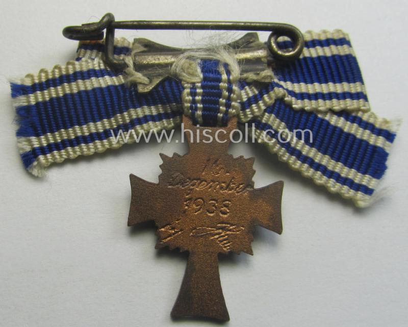 Miniature of an: 'Ehrenkreuz der deutschen Mutter - dritte Stufe' (or: bronze-class mothers'-cross) being a non-maker-marked example that comes in an overall nice- (albeit moderately worn- ie. used-), condition