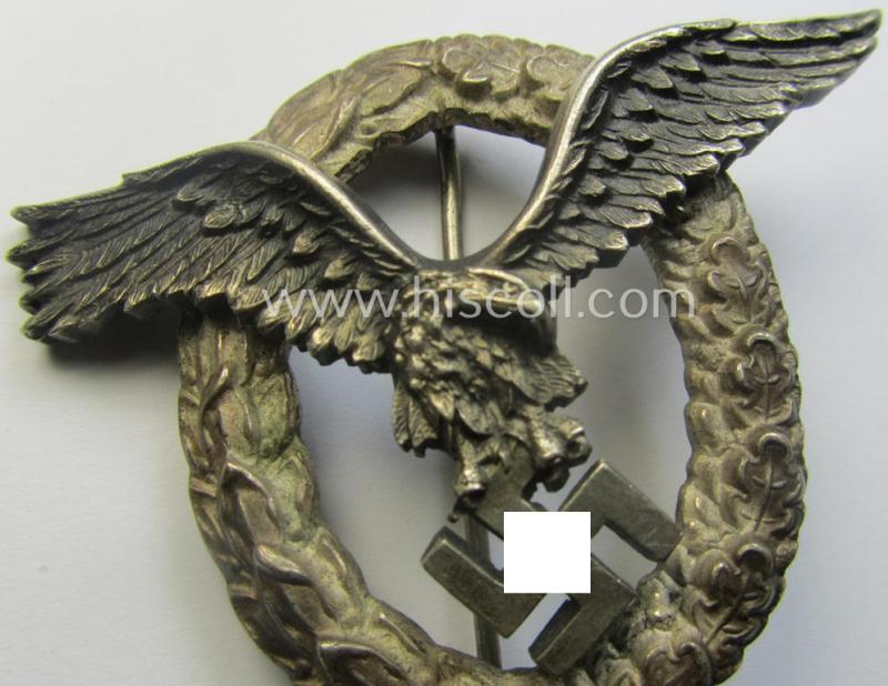 Early- (ie. pre-) war-period- and/or: 'Buntmetall'- (ie. 'Tombak'-) based: WH (Luftwaffe) 'Flugzeugführerabzeichen' (or: pilots-badge) being a maker- (ie. 'C.E. Juncker'-) marked example of the 'J2'-pattern