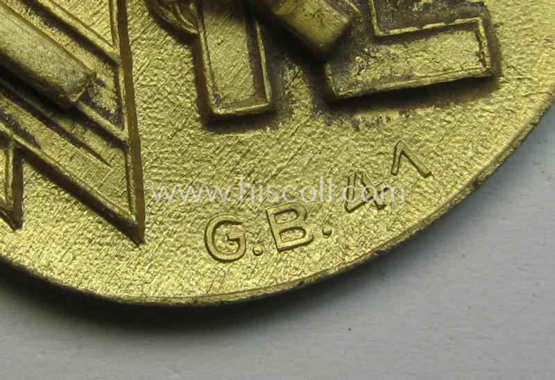 Superb, WH (KM) tropical- (ie. 'DAK'- or: 'Deutsches Afrikakorps'-) related- and/or zinc-based, eagle-'pith-helmet'-shield being a maker- (ie. 'G.B.-41'-) marked example that comes in a very nice- (ie. 'virtually mint- ie. unissued'-), cond...