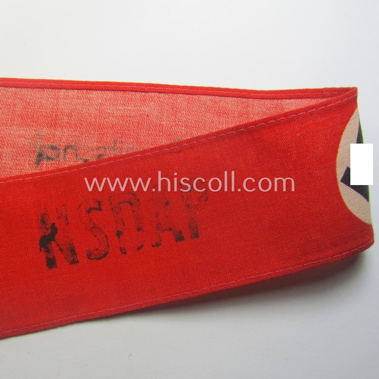 Unusually encountered - and most certainly scarcely seen! - thin-shaped, 'N.S.D.A.P.'-related armband (ie. 'Armbinde') being of the 'entirely printed'-type showing a swastika and text: 'NSDAP - Partei-Bereitschaft'