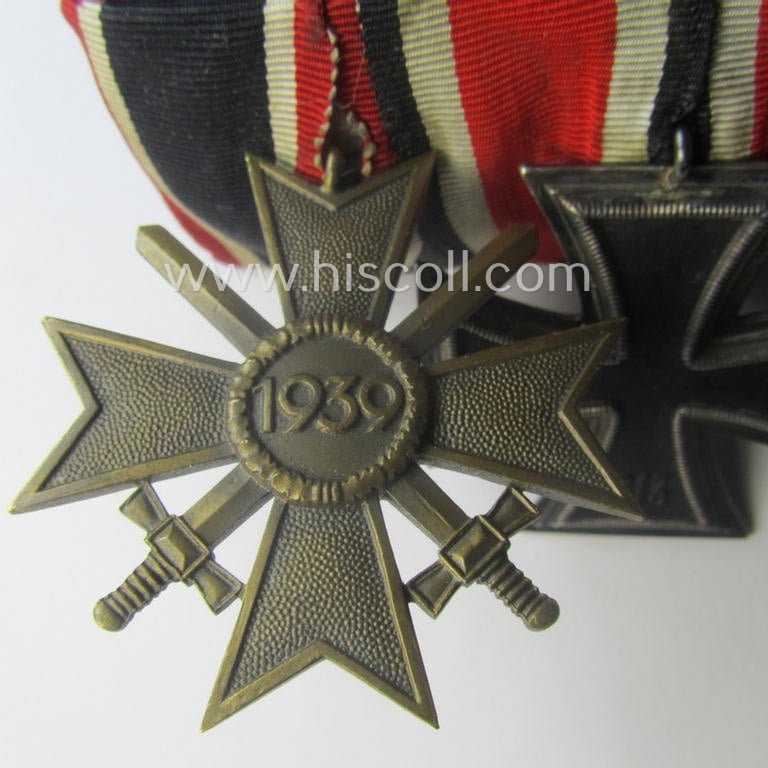 Two-pieced medal-bar (ie. 'Orden- o. Doppelspange') showing resp. an: 'Eisernes Kreuz II. Kl.' and a: 'Kriegsverdienstkreuz II. Klasse mit Schwn.' that both come period-mounted as a: 'Doppelspange'