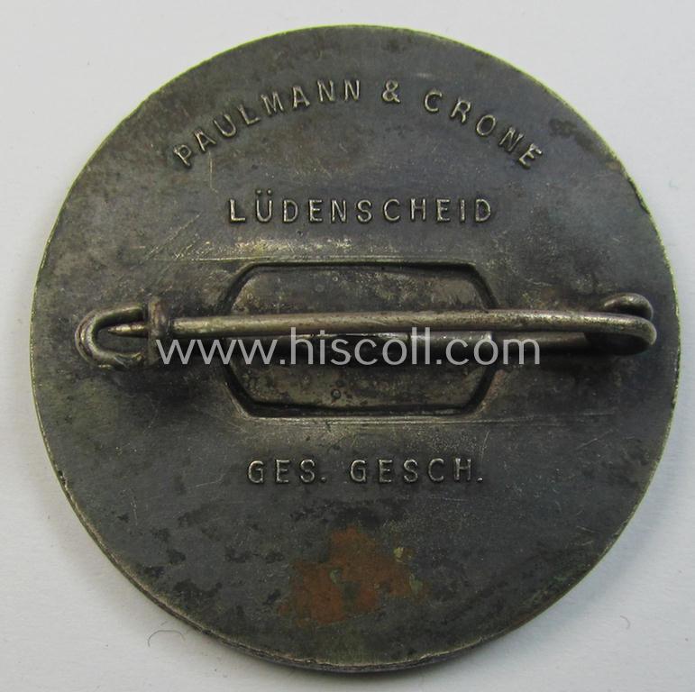 Commemorative, silvered 'Buntmetall'-based N.S.D.A.P.- (ie. WHW-) related 'tinnie' being a maker- (ie. 'Paulmann u. Crone'-) marked example depicting A.Hitler and text: 'Hitlers' Dank für den Dienst am Volke - Gau Süd-Hannover - Braunschweig...