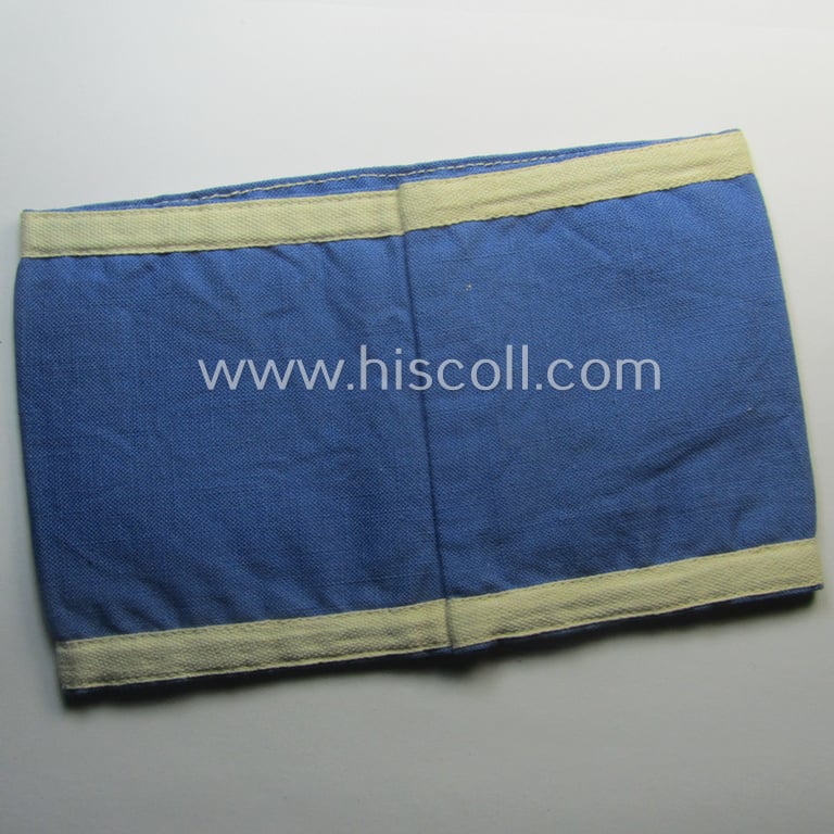 Unusually seen, linnen-based- and/or light-blue-coloured, DAF- (ie. KDF-) related armband (ie. 'Armbinde') showing white-linnen-toned borders and depicting the typical 'KDF'-logo and text: 'Stadtführer - N.S.G. Kraft durch Freude'