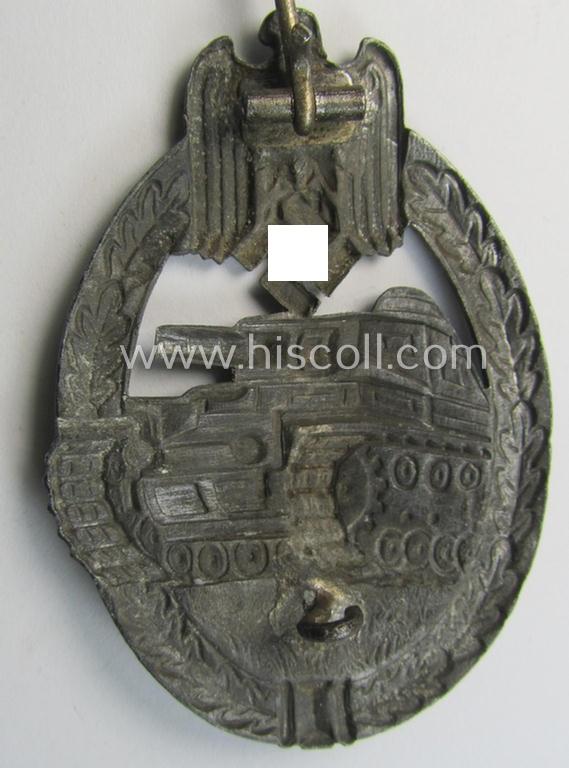 'Panzerkampfabzeichen in Silber' (or: silver-class panzer-assault badge or PAB) being a non-maker-marked- and/or hollow zinc- (ie. 'Feinzink'-) based example as was produced by the: 'Paul Meybauer'-company